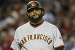 PHOENIX, AZ - SEPTEMBER 24:  Pablo Sandoval #48 of the San Francisco Giants walks back to the dugout after striking out against the Arizona Diamondbacks during a Major League Baseball game at Chase Field on September 24, 2011 in Phoenix, Arizona.  (Photo by Ralph Freso/Getty Images)