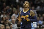 CHARLOTTE, NC - DECEMBER 07:  J.R. Smith #5 of the Denver Nuggets celebrates after making a basket against the Charlotte Bobcats during their game at Time Warner Cable Arena on December 7, 2010 in Charlotte, North Carolina.  NOTE TO USER: User expressly acknowledges and agrees that, by downloading and/or using this Photograph, User is consenting to the terms and conditions of the Getty Images License Agreement.  (Photo by Streeter Lecka/Getty Images)
