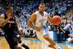 CHAPEL HILL, NC - FEBRUARY 11:  Kendall MArshall #5 of the North Carolina Tar Heels drives against Jontel Evans #1 of the Virginia Cavaliers during play at the Dean Smith Center on February 11, 2012 in Chapel Hill, North Carolina. North Carolina won 70-52.  (Photo by Grant Halverson/Getty Images)