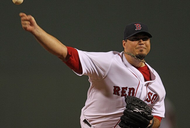 BOSTON, MA - SEPTEMBER 21:  Josh Beckett #19 of the Boston Red Sox throws against the Baltimore Orioles in the 1st inning at Fenway Park September 21, 2011 in Boston, Massachusetts. (Photo by Jim Rogash/Getty Images)