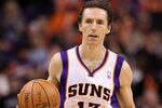 PHOENIX, AZ - JANUARY 12:  Steve Nash #13 of the Phoenix Suns in action during the NBA game against the Cleveland Cavaliers at US Airways Center on January 12, 2012 in Phoenix, Arizona.  NOTE TO USER: User expressly acknowledges and agrees that, by downloading and or using this photograph, User is consenting to the terms and conditions of the Getty Images License Agreement.  (Photo by Christian Petersen/Getty Images)