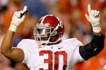 AUBURN, AL - NOVEMBER 26:  Dont'a Hightower #30 of the Alabama Crimson Tide calls the defense against the Auburn Tigers at Jordan-Hare Stadium on November 26, 2011 in Auburn, Alabama.  (Photo by Kevin C. Cox/Getty Images)