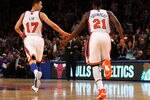 NEW YORK, NY - FEBRUARY 10:  (L-R) Jeremy Lin #17 and Iman Shumpert #21 of the New York Knicks celebrate a play against the Los Angeles Lakers at Madison Square Garden on February 10, 2012 in New York City.  NOTE TO USER: User expressly acknowledges and agrees that, by downloading and or using this photograph, User is consenting to the terms and conditions of the Getty Images License Agreement.  (Photo by Chris Chambers/Getty Images)
