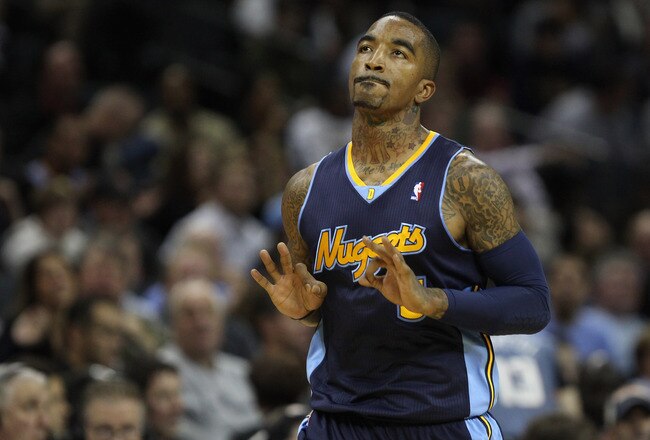 CHARLOTTE, NC - DECEMBER 07:  J.R. Smith #5 of the Denver Nuggets celebrates after making a basket against the Charlotte Bobcats during their game at Time Warner Cable Arena on December 7, 2010 in Charlotte, North Carolina.  NOTE TO USER: User expressly acknowledges and agrees that, by downloading and/or using this Photograph, User is consenting to the terms and conditions of the Getty Images License Agreement.  (Photo by Streeter Lecka/Getty Images)