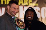 LONDON, ENGLAND - JANUARY 09:  (L-R) Vitali Klitschko of the Ukraine and Dereck Chisora of England during a press conference at The Landmark Hotel on January 9, 2012 in London, England.  (Photo by Andrew Redington/Getty Images)