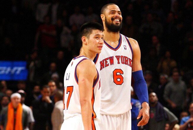 NEW YORK, NY - FEBRUARY 10:  (L-R) Jeremy Lin #17 and Tyson Chandler #6 of the New York Knicks look on against the Los Angeles Lakers at Madison Square Garden on February 10, 2012 in New York City.  NOTE TO USER: User expressly acknowledges and agrees that, by downloading and or using this photograph, User is consenting to the terms and conditions of the Getty Images License Agreement.  (Photo by Chris Chambers/Getty Images)