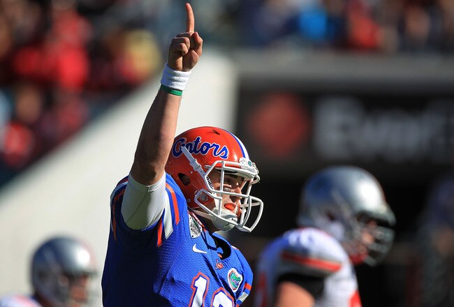 JACKSONVILLE, FL - JANUARY 02:  Quarterback John Brantley #12 of the Florida Gators celebrates a first half touchdown during the TaxSlayer.com Gator Bowl against the Ohio State Buckeyes at EverBank Field on January 2, 2012 in Jacksonville, Florida.  (Photo by Scott Halleran/Getty Images)