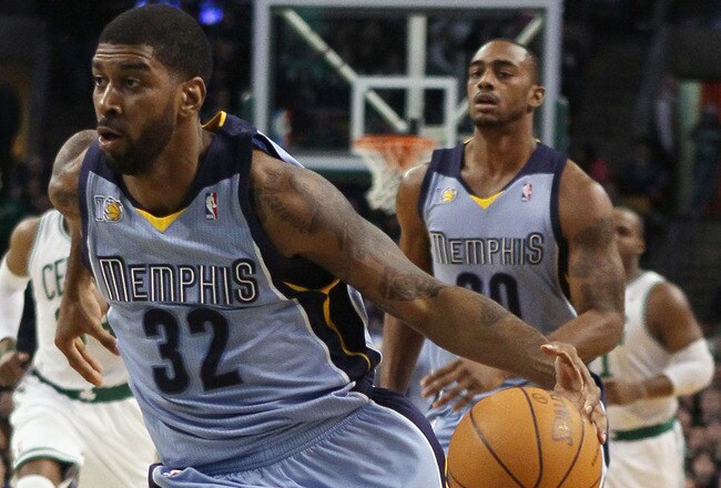 BOSTON, MA - MARCH 23:  O.J. Mayo #32 of the Memphis Grizzlies heads for the net in the first half against the Boston Celtics on March 23, 2011 at the TD Garden in Boston, Massachusetts.  NOTE TO USER: User expressly acknowledges and agrees that, by downloading and/or using this Photograph, User is consenting to the terms and conditions of the Getty Images License Agreement.  (Photo by Elsa/Getty Images)