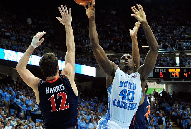 CHAPEL HILL, NC - FEBRUARY 11:  Harrison Barnes #40 of the North Carolina Tar Heels shoots over Joe Harris #12 of the Virginia Cavaliers during play at the Dean Smith Center on February 11, 2012 in Chapel Hill, North Carolina. North Carolina won 70-52.  (Photo by Grant Halverson/Getty Images)