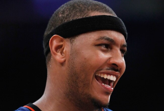 LOS ANGELES, CA - DECEMBER 29:  Carmelo Anthony #7 of the New York Knicks looks on against the Los Angeles Lakers at Staples Center on December 29, 2011 in Los Angeles, California. NOTE TO USER: User expressly acknowledges and agrees that, by downloading and or using this photograph, User is consenting to the terms and conditions of the Getty Images License Agreement.  (Photo by Jeff Gross/Getty Images)