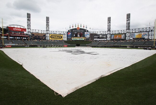 CHICAGO, IL - JUNE 22: A tarp covers the field before the Chicago Cubs take on the Chicago White Sox at U.S. Cellular Field on June 22, 2011 in Chicago, Illinois. The White Sox defeated the Cubs 
4-3. (Photo by Jonathan Daniel/Getty Images)