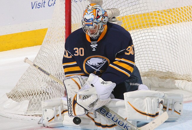 BUFFALO, NY - FEBRUARY 08: Ryan Miller #30 of the Buffalo Sabres makes a blocker save against the Boston Bruins  at First Niagara Center on February 8, 2012 in Buffalo, New York. Buffalo won 6-0.  (Photo by Rick Stewart/Getty Images)