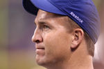 INDIANAPOLIS, IN - NOVEMBER 27:  Peyton Manning of the Indianapolis Colts watches the action during the game against the Carolina Panthers at Lucas Oil Stadium on November 27, 2011 in Indianapolis, Indiana.  (Photo by Andy Lyons/Getty Images)