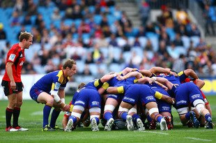DUNEDIN, NEW ZEALAND - MARCH 19:  Jimmy Cowan of the Highlanders feeds the scrum during the round five Super Rugby match between the Highlanders and the Crusaders at Carisbrook on March 19, 2011 in Dunedin, New Zealand.  (Photo by Teaukura Moetaua/Getty Images)