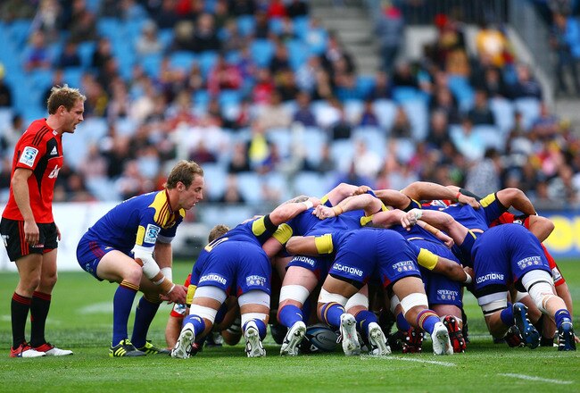 DUNEDIN, NEW ZEALAND - MARCH 19:  Jimmy Cowan of the Highlanders feeds the scrum during the round five Super Rugby match between the Highlanders and the Crusaders at Carisbrook on March 19, 2011 in Dunedin, New Zealand.  (Photo by Teaukura Moetaua/Getty Images)