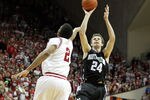 BLOOMINGTON, IL - FEBRUARY 15:  John Shurna #24 of the Northwestern Wildcats shoots the ball while defended by Christian Watford #2 of the Indiana Hoosiers during the Big Ten Conference game at Assembly Hall on February 15, 2012 in Bloomington, Indiana.  (Photo by Andy Lyons/Getty Images)