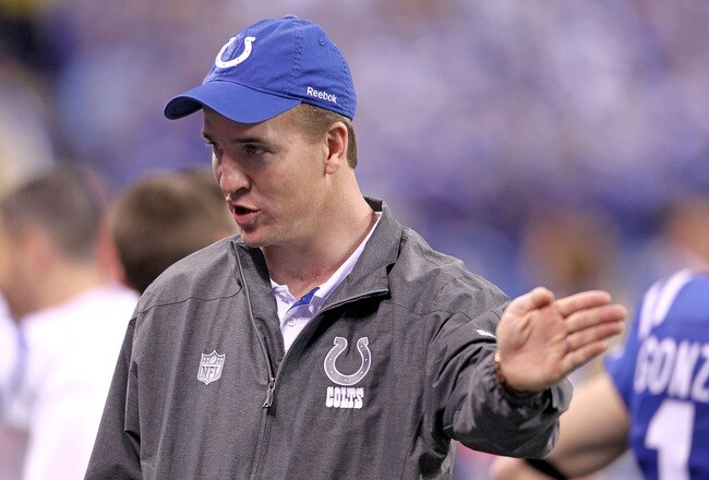 INDIANAPOLIS, IN - DECEMBER 22:  Peyton Manning  #18 of the Indianapolis Colts gives instructions to his teammates during the NFL against  the Houston Texans at Lucas Oil Stadium on December 22, 2011 in Indianapolis, Indiana.  (Photo by Andy Lyons/Getty Images)