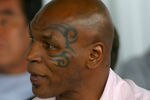 CANASTOTA, NY - JUNE 12: Mike Tyson listens during the 2011 International Boxing Hall of Fame Inductions at the International Boxing Hall of Fame on June 12, 2011 in Canastota, New York.  (Photo by Rick Stewart/Getty Images)