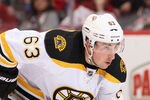 GLENDALE, AZ - DECEMBER 28:  Brad Marchand #63 of the Boston Bruins during the NHL game against the Phoenix Coyotes at Jobing.com Arena on December 28, 2011 in Glendale, Arizona. The Bruins defeated the Coyotes 2-1 in overtime.  (Photo by Christian Petersen/Getty Images)