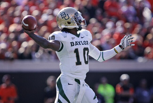 STILLWATER, OK - OCTOBER 29:  Quarterback Robert Griffin III #10 of the Baylor Bears looks to throw in the first half against the Oklahoma State Cowboys on October 29, 2011 at Boone Pickens Stadium in Stillwater, Oklahoma.  Oklahoma State defeated Baylor 59-24.  (Photo by Brett Deering/Getty Images)