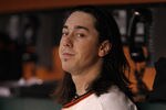 SAN FRANCISCO, CA - AUGUST 24:  Starting pitcher Tim Lincecum #55 of the San Francisco Giants sits in the dugout during their game against the San Diego Padres at AT&T Park on August 24, 2011 in San Francisco, California.  (Photo by Ezra Shaw/Getty Images)