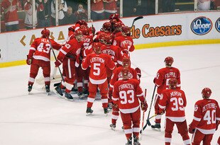DETROIT, MI - FEBRUARY 14: The Detroit Red Wings celebrate their NHL record breaking 21st consecutive home victory by beating the Dallas Stars 3-1 at Joe Louis Arena on February 14, 2012 in Detroit, Michigan. (Photo by Gregory Shamus/Getty Images)