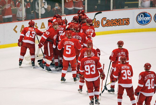 DETROIT, MI - FEBRUARY 14: The Detroit Red Wings celebrate their NHL record breaking 21st consecutive home victory by beating the Dallas Stars 3-1 at Joe Louis Arena on February 14, 2012 in Detroit, Michigan. (Photo by Gregory Shamus/Getty Images)