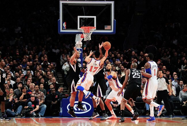 NEW YORK, NY - FEBRUARY 15: Jeremy Lin #17 of the New York Knicks shoots against the Sacramento Kings at Madison Square Garden on February 15, 2012 in New York City. NOTE TO USER: User expressly acknowledges and agrees that, by downloading and/or using this Photograph, user is consenting to the terms and conditions of the Getty Images License Agreement.  (Photo by Chris Trotman/Getty Images)
