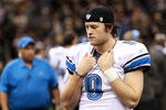 NEW ORLEANS, LA - JANUARY 07:  Matthew Stafford #9 of the Detroit Lions looks on from the bench against the New Orleans Saints during their 2012 NFC Wild Card Playoff game at Mercedes-Benz Superdome on January 7, 2012 in New Orleans, Louisiana.  (Photo by Ronald Martinez/Getty Images)