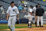 NEW YORK, NY - SEPTEMBER 07: A.J. Burnett #34 of the New York Yankees walks back to the dugout after being taken out of the game in the top of the seventh inning against the Baltimore Orioles and New York Yankees on September 7, 2011 at Yankee Stadium in the Bronx borough of New York City. (Photo by Christopher Pasatieri/Getty Images)