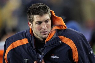 FOXBORO, MA - JANUARY 14:  Tim Tebow #15 of the Denver Broncos looks on against the New England Patriots during their AFC Divisional Playoff Game at Gillette Stadium on January 14, 2012 in Foxboro, Massachusetts.  (Photo by Jim Rogash/Getty Images)