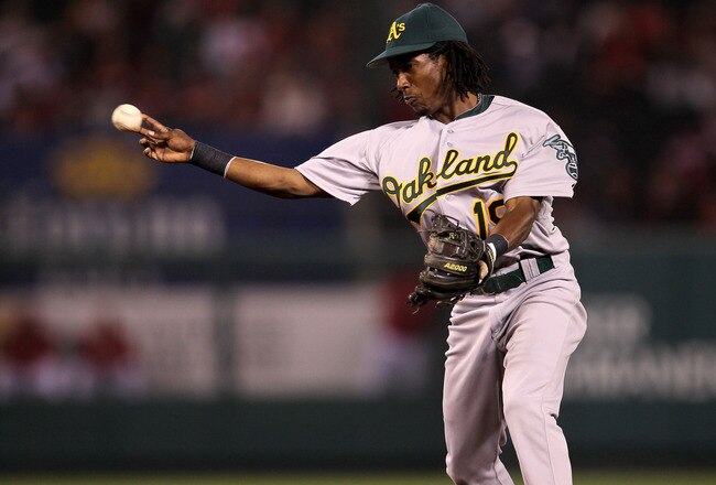 ANAHEIM, CA - SEPTEMBER 24:  Second baseman Jemile Weeks #19 of the Oakland Athletics throws out Bobby Abreu #53 of the Los Angeles Angels of Anaheim in the fourth inning on September 24, 2011 at Angel Stadium in Anaheim, California.  (Photo by Stephen Dunn/Getty Images)