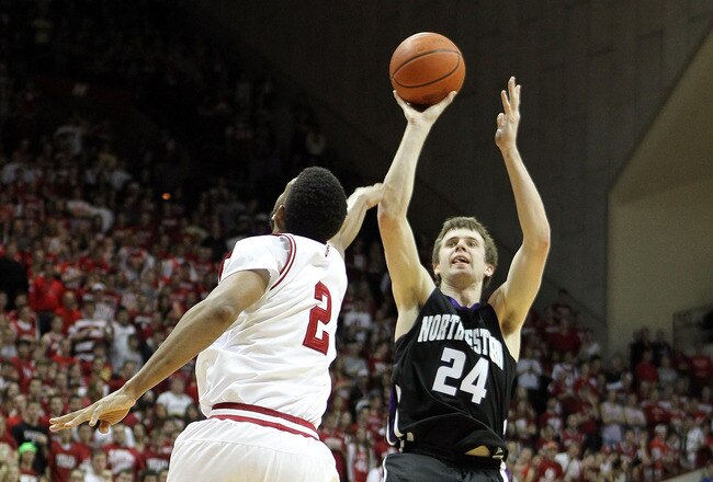 BLOOMINGTON, IL - FEBRUARY 15:  John Shurna #24 of the Northwestern Wildcats shoots the ball while defended by Christian Watford #2 of the Indiana Hoosiers during the Big Ten Conference game at Assembly Hall on February 15, 2012 in Bloomington, Indiana.  (Photo by Andy Lyons/Getty Images)