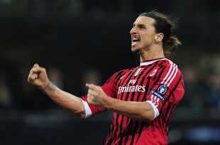 MILAN, ITALY - FEBRUARY 15:  Zlatan Ibrahimovic of AC Milan celebrates scoring his penalty during the UEFA Champions League round of 16 first leg match between AC Milan and Arsenal at Stadio Giuseppe Meazza on February 15, 2012 in Milan, Italy.  (Photo by Shaun Botterill/Getty Images)