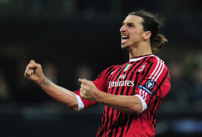 MILAN, ITALY - FEBRUARY 15:  Zlatan Ibrahimovic of AC Milan celebrates scoring his penalty during the UEFA Champions League round of 16 first leg match between AC Milan and Arsenal at Stadio Giuseppe Meazza on February 15, 2012 in Milan, Italy.  (Photo by Shaun Botterill/Getty Images)