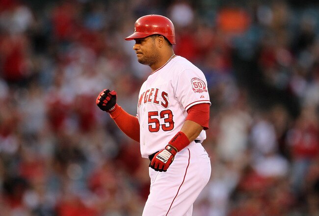 ANAHEIM, CA - AUGUST 20:  Bobby Abreu #53 of the Los Angeles Angels of Anaheim looks to his dugout and pumps his fist after hitting a two run double in the third inning against the Baltimore Orioles on August 20, 2011 at Angel Stadium in Anaheim, California.  (Photo by Stephen Dunn/Getty Images)