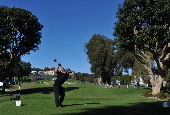 PACIFIC PALISADES, CA - FEBRUARY 20: Yuta Ikeda of Japan hits his tee shot on the 9th hole during the final round of the Northern Trust Open at the Riviera Country Club on February 20, 2011 in Pacific Palisades, California. (Photo by Steve Dykes/Getty Images)