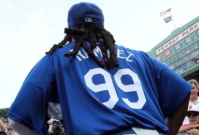 BOSTON - JUNE 18:  Manny Ramirez #99 of the Los Angeles Dodgers  walks onto the field before a game with the Boston Red Sox at Fenway Park on June 18, 2010 in Boston, Massachusetts. (Photo by Jim Rogash/Getty Images)