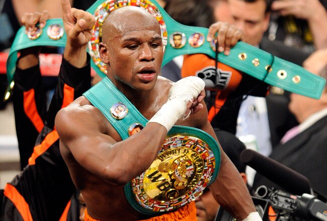 LAS VEGAS, NV - SEPTEMBER 17:  Floyd Mayweather Jr. celebrates his fourth-round knockout of Victor Ortiz to win the WBC welterweight title September 17, 2011 in Las Vegas, Nevada.  (Photo by Ethan Miller/Getty Images)