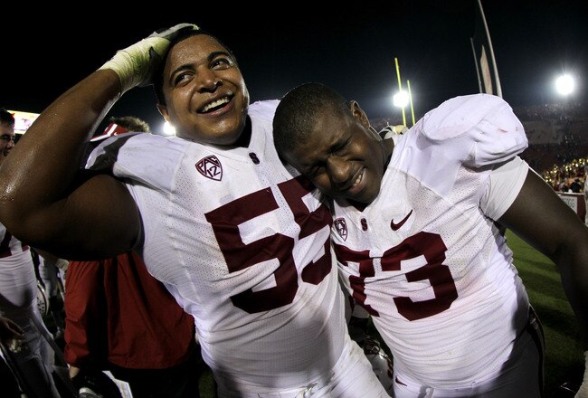 LOS ANGELES, CA - OCTOBER 29:  Offensive tackles Jonathan Martin #54 and Cameron Fleming #73 of the Stanford Cardinal celebrate after the game with the USC Trojans at the Los Angeles Memorial Coliseum on October 29, 2011 in Los Angeles, California. Stanford won 56-48 in three overtimes.  (Photo by Stephen Dunn/Getty Images)