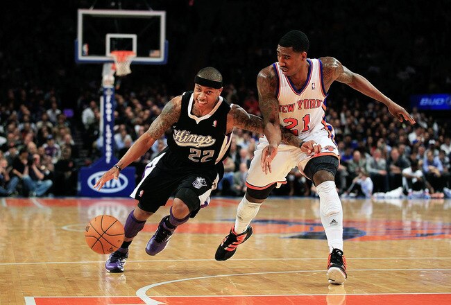 NEW YORK, NY - FEBRUARY 15: Isaiah Thomas #22 of the Sacramento Kings drives against Iman Shumpert #21 of the New York Knicks at Madison Square Garden on February 15, 2012 in New York City. NOTE TO USER: User expressly acknowledges and agrees that, by downloading and/or using this Photograph, user is consenting to the terms and conditions of the Getty Images License Agreement.  (Photo by Chris Trotman/Getty Images)
