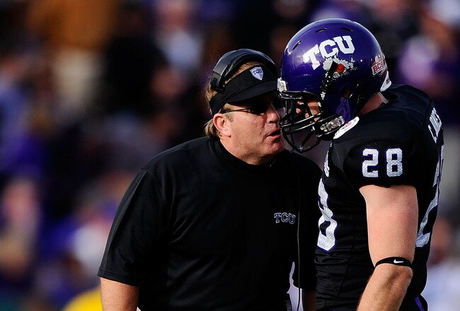 PASADENA, CA - JANUARY 01:  Head coach Gary Patterson of the TCU Horned Frogs talks with safety Colin Jones #28 on the field during their game against the Wisconsin Badgers in the 97th Rose Bowl game on January 1, 2011 in Pasadena, California.  (Photo by Kevork Djansezian/Getty Images)