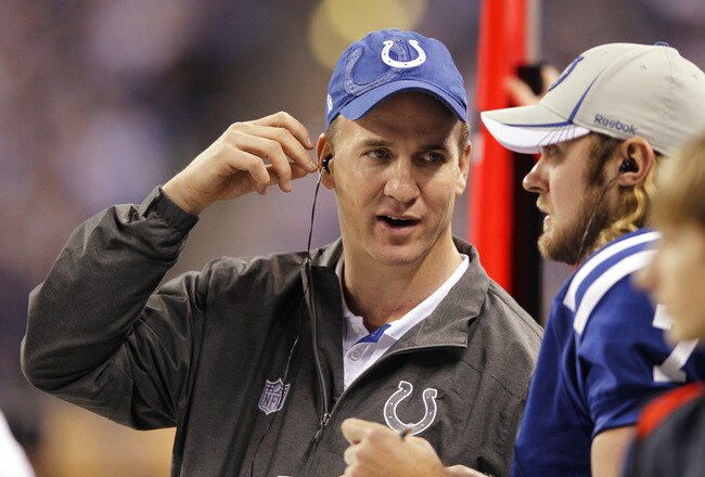INDIANAPOLIS, IN - DECEMBER 22: Indianapolis Colts quarterback Peyton Manning looks on during the game against the Houston Texans at Lucas Oil Stadium on December 22, 2011 in Indianapolis, Indiana. The Colts defeated the Texans 19-16. (Photo by Joe Robbins/Getty Images)