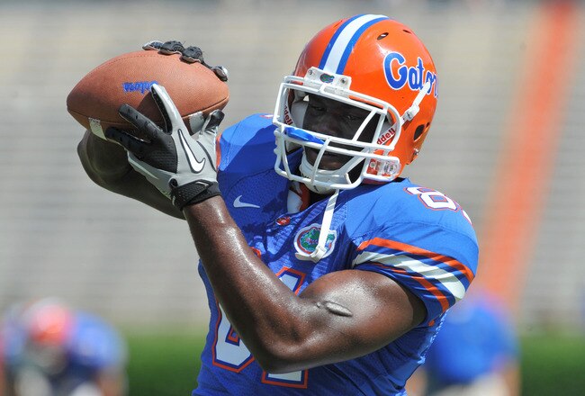 GAINESVILLE, FL - APRIL 9:  Tight end A. C. Leonard #81 of the Florida Gators grabs a warmup pass before the Orange and Blue spring football game April 9, 2011 at Ben Hill Griffin Stadium in Gainesville, Florida.  (Photo by Al Messerschmidt/Getty Images)