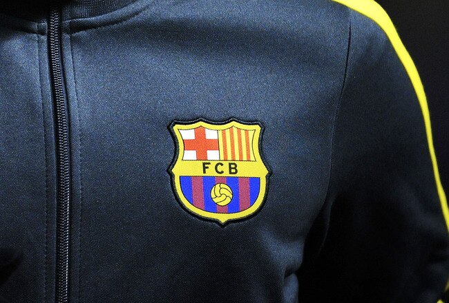 PAMPLONA, SPAIN - FEBRUARY 11: Dani Alves of FC Barcelona looks on during the warm up prior to the La Liga match between CA Osasuna and FC Barcelona at the Reyno de Navarra Stadium on February 11, 2012 in Pamplona, Spain. CA Osasuna won 3-2.  (Photo by David Ramos/Getty Images)
