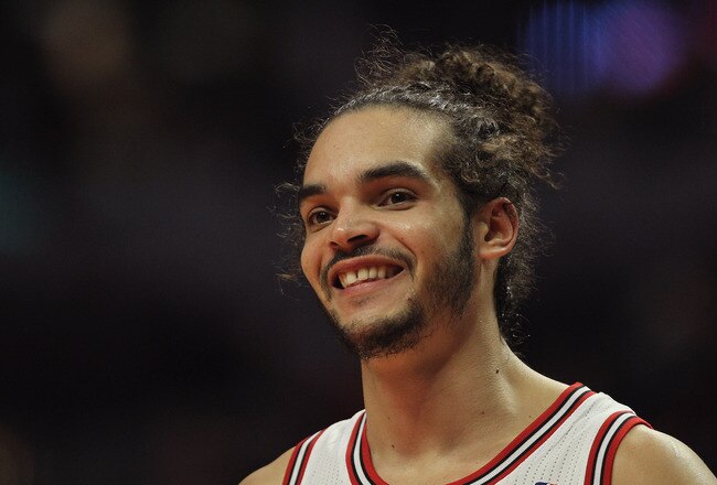 CHICAGO, IL - FEBRUARY 14:  Joakim Noah #13 of the Chicago Bulls smiles in the final seconds of a game against the Sacramento Kings at the United Center on February 14, 2012 in Chicago, Illinois. The Bulls defeated the Kings 121-115. NOTE TO USER: User expressly acknowledges and agrees that, by downloading and or using this photograph, User is consenting to the terms and conditions of the Getty Images License Agreement.  (Photo by Jonathan Daniel/Getty Images)