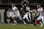 STARKVILLE, MS - NOVEMBER 12:  quarterback AJ McCarron #10 of the Alabama Crimson Tide scrambles away from pressure from defensive lineman Fletcher Cox #94 of the Mississippi State Bulldogs on November 12, 2011 at Davis Wade Stadium in Starkville, Mississippi. Alabama won 24-7. (Photo by Butch Dill/Getty Images)