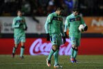 PAMPLONA, SPAIN - FEBRUARY 11:  Alexis Sanchez of FC Barcelona looks down dejected after CA Osasuna scored the third goal during the La Liga match between CA Osasuna and FC Barcelona at the Reyno de Navarra Stadium on February 11, 2012 in Pamplona, Spain. CA Osasuna won 3-2.  (Photo by David Ramos/Getty Images)