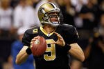 NEW ORLEANS, LA - JANUARY 07:   Drew Brees #9 of the New Orleans Saints drops back to pass against the Detroit Lions during their 2012 NFC Wild Card Playoff game at Mercedes-Benz Superdome on January 7, 2012 in New Orleans, Louisiana.  (Photo by Chris Graythen/Getty Images)