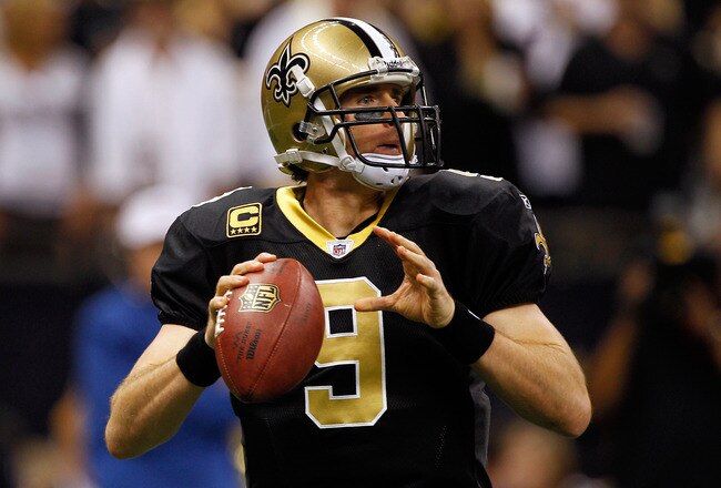 NEW ORLEANS, LA - JANUARY 07:   Drew Brees #9 of the New Orleans Saints drops back to pass against the Detroit Lions during their 2012 NFC Wild Card Playoff game at Mercedes-Benz Superdome on January 7, 2012 in New Orleans, Louisiana.  (Photo by Chris Graythen/Getty Images)